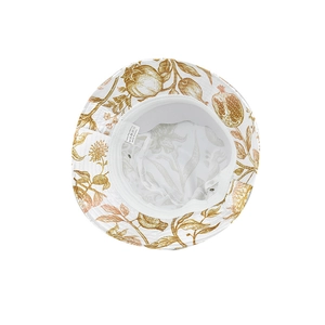 Detail of floral printed white bucket hat showing 100% polyester wash label and lining