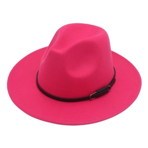 Detailed view of the fuchsia felt fedora hat featuring a black faux leather band and metal buckle