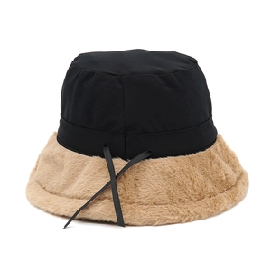 Winter faux rabbit fur bucket hat in black and khaki patchwork with ribbon detail