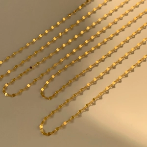Double-layered golden stainless steel lip chain necklace with high-shine polished finish