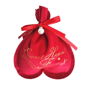 Red heart-shaped velvet gift bag with Sweet Heart Forever gold text and pearl ribbon