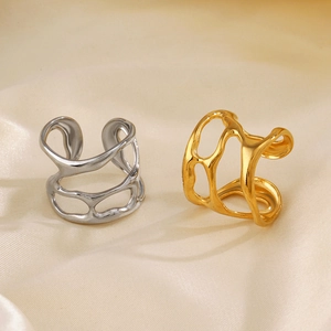 Adjustable organic wavy hollow rings in gold and silver finish on silk fabric