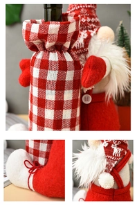Detail of Christmas gnome wine bottle cover with red knit hat and soft white faux fur beard