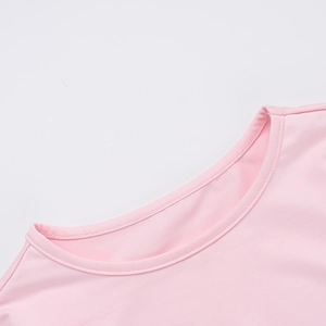 Close-up of the elegant crew neck and double-needle stitching on the pink dress