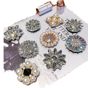 Luxe crystal and pearl gem-encrusted expanding phone grips in various floral designs