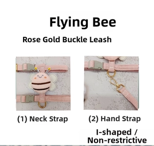 Detail of pink corduroy dog harness with plush bee and rose gold metal buckles