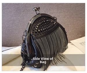 Side view of black gothic shell bag featuring dense metal studs and silver chain tassels
