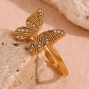 Detailed macro view of the 18K gold plated butterfly ring with sparkling zircon crystals