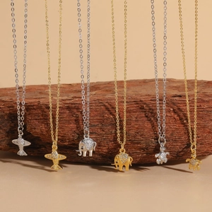 Sparkling zircon airplane elephant and turtle pendant necklaces in gold and silver finish