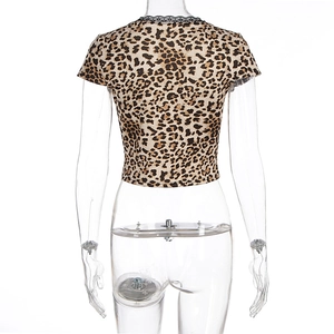 Back view of leopard print crop top with black lace trim and slim fit design