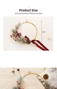 Detail of 28cm Christmas wreath with gold metal ring, LED lights, and red berries