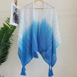 Blue and white gradient hollow knit shawl for women featuring fringe tassels and elegant design