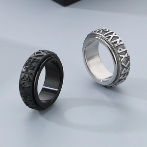 Rotating Nordic rune stainless steel rings in black and silver finishes for a viking look