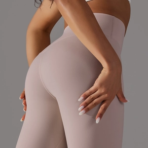Close-up of high-waisted seamless yoga leggings showing lifting effect and soft fabric