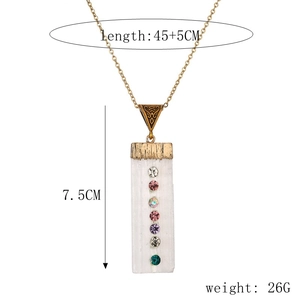 Vertical view of white resin stone necklace with size labels and colorful crystal details