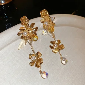 Golden flower earrings with pearls and long crystal fringe tassels for women