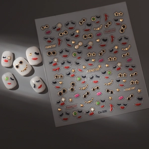 Nail art stickers with red lips, golden heels, and fashion motifs with 3D embossed texture