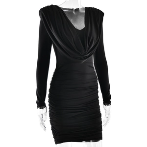 Detail view of black V-neck long-sleeve dress with ruching effects and bodycon fit