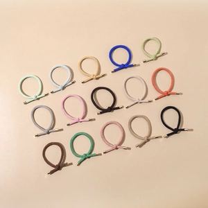14-piece set of high-elasticity braided hair ties with metal ends and decorative knots