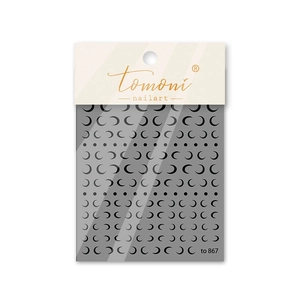 Close-up of black crescent moon nail art stickers with elegant gold branding packaging