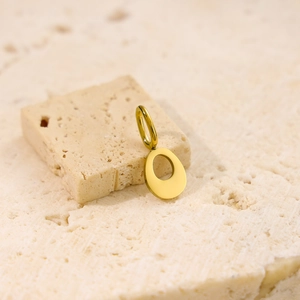 Minimalist gold stainless steel necklace featuring a hollow oval pendant on textured stone