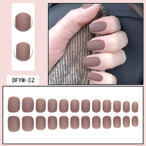 Detailed set of 24 matte brown press-on nails with full array and hand wearing demo