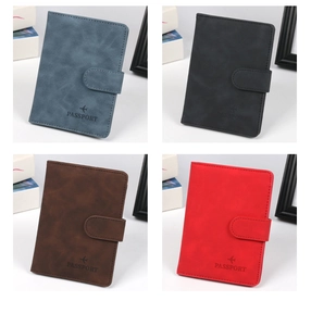 Detailed view of passport covers in four matte leather colors with embossed icons