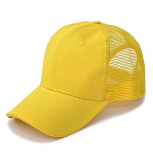 Close-up of bright yellow cotton baseball mesh cap showing breathable mesh and peak stitching