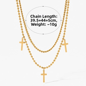Double-layered gold cross pendant necklace with flat link and bead chains showing dimensions