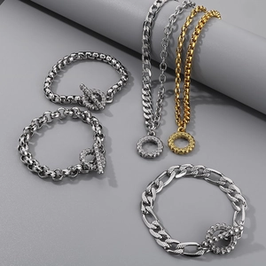 Bracciale unisex a strati argento e oro con chiusura a levetta OT e texture diamante