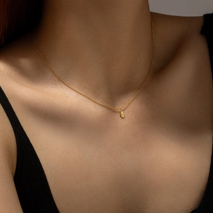 Elegant S925 sterling silver pear-shaped pendant necklace with star engraving on model