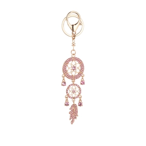 Rose gold dreamcatcher keychain with pink crystals and feather pendant on white backdrop