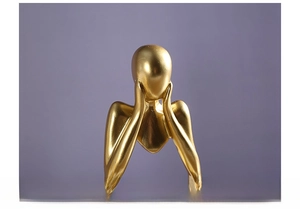 Macro shot of abstract resin sculpture with metallic gold finish and seamless structure