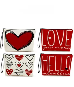 Set of four heart print canvas makeup bags with festive Love and Valentine designs