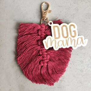 Detail of burgundy macrame leaf keychain with gold metal clasp and wood Dog Mama tag