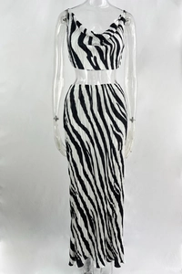 Detail of black and white zebra print on pleated fabric two-piece set for women
