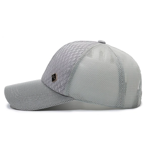 Breathable grey mesh baseball cap for men featuring a side metal logo and adjustable strap