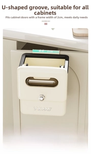 Detail of cream wall-mounted kitchen bin with U-shaped hook fitting 2cm cabinet doors