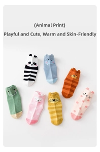 Close-up of 7-pack colorful cartoon animal baby socks with 3D ears and non-slip soles