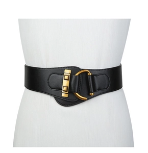 Detail of a black wide elastic waist belt for women with a gold D-shaped metal buckle