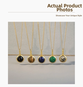Detail of five different natural stone pendant necklaces with gold fine chains