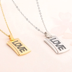 Polished gold and silver stainless steel square pendant necklaces with LOVE engraving