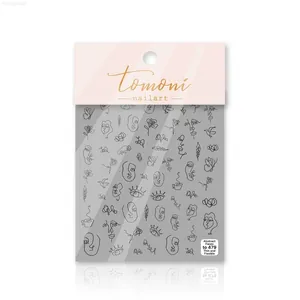 Detail of TO-479 nail art stickers with abstract face lines and floral patterns