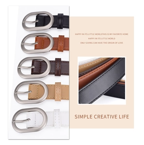 Detail of minimalist women's leather belts with oval silver buckles in five colors