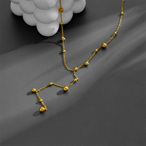 Elegant gold titanium steel Y-shaped necklace with multiple beads on long tassel chain