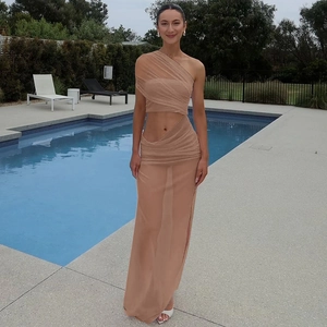 Two-piece mesh set with one-shoulder top and high-waist slit skirt in nude color