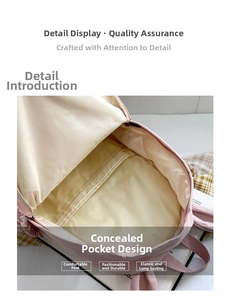 Detail view of pink backpack inner compartment featuring a zip pocket and lining