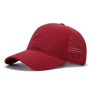 Red quick-dry baseball cap with laser-cut ventilation holes and UV protection