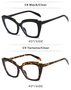 Side view of cat-eye sunglasses in black and tortoise frames with clear lenses