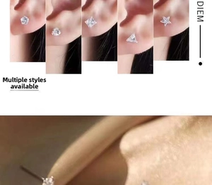 Detailed view of various S999 sterling silver geometric stud earrings with zircons
